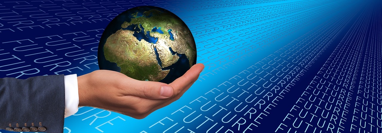 hand holding a globe